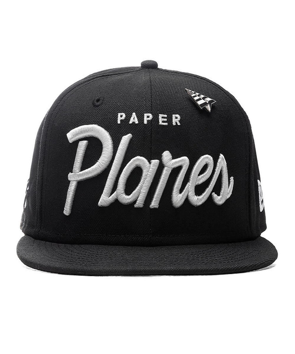 Black and white paper top plane hat