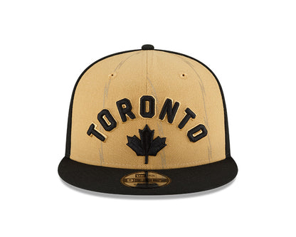 New Era Tan/Black Toronto Raptors 2023/24 City Edition Official 9FIFTY Snapback Hat