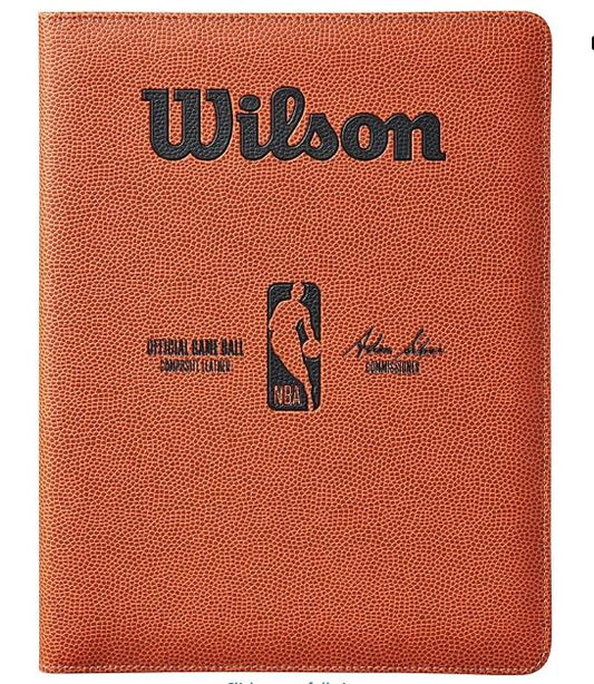 Basketball with Wilson branding and NBA logo on a brown background