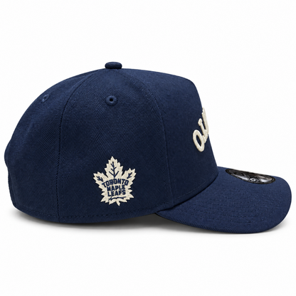 New Era NHL Toronto Maple Leafs Upside Down Wordmark 9FORTY A-Frame Adjustable Snapback Hat – Navy